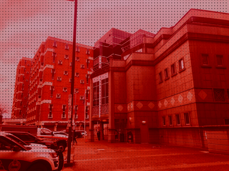 Exterior shot of Allegheny County Jail and courthouse in a red filter with black dots